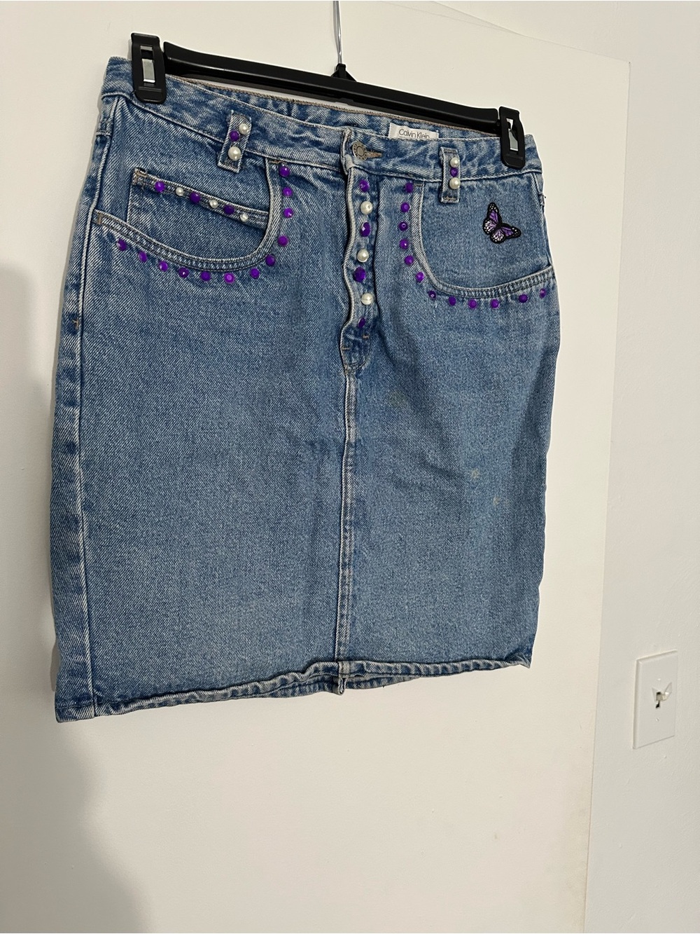 Calvin Klein Blue Denim Mini Skirt with Purple Stud Accents